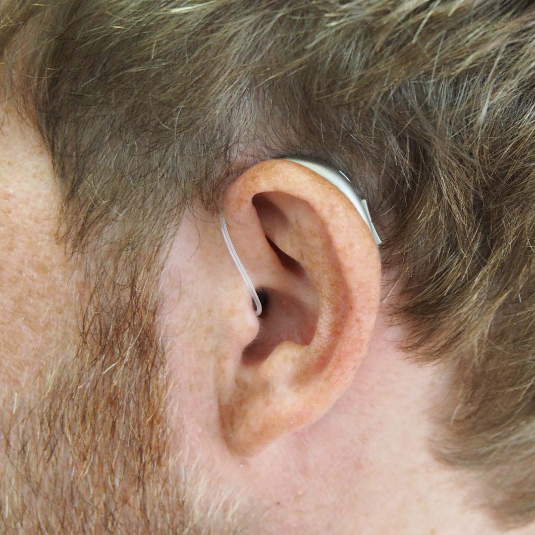 Man with hearing aids