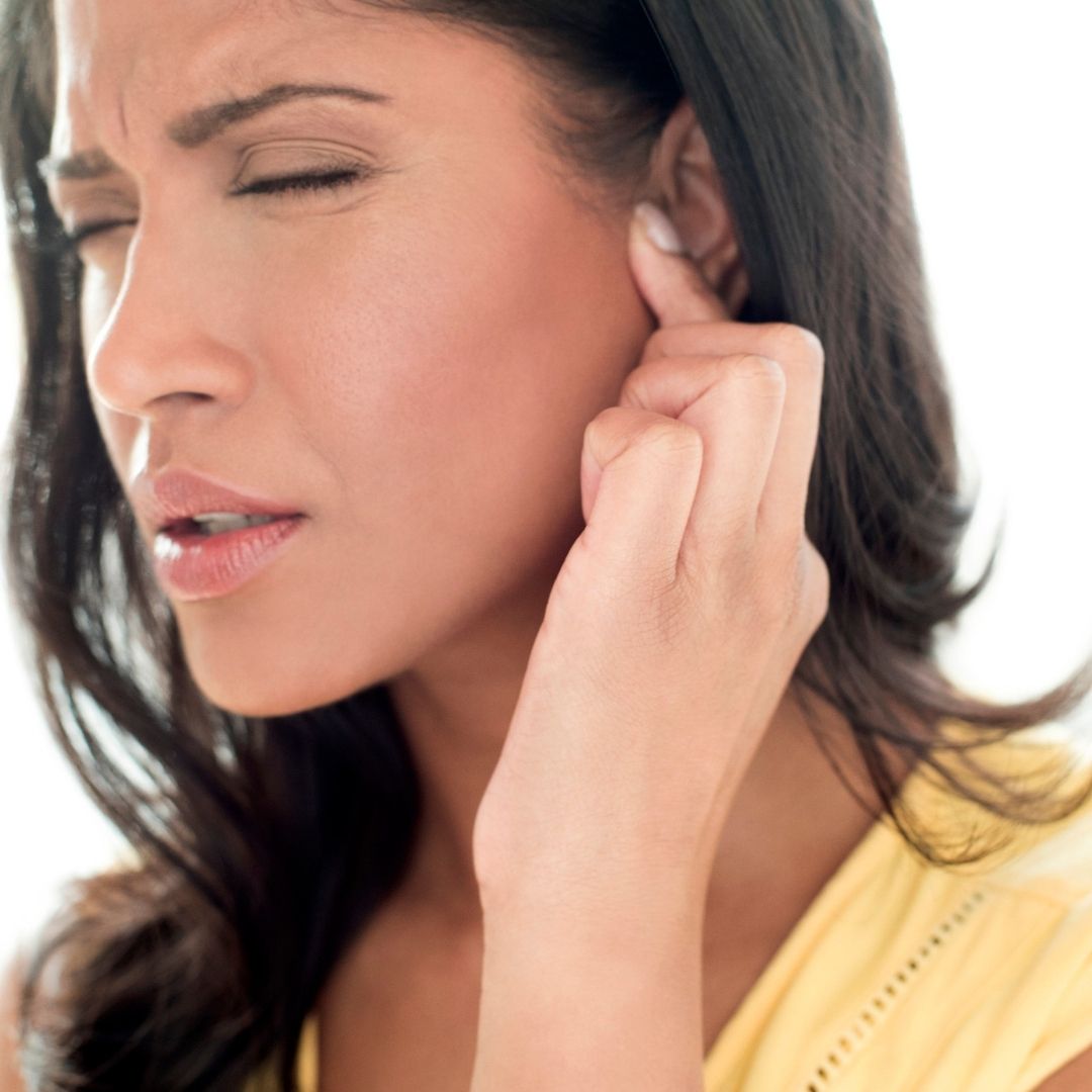 Woman with ear pain