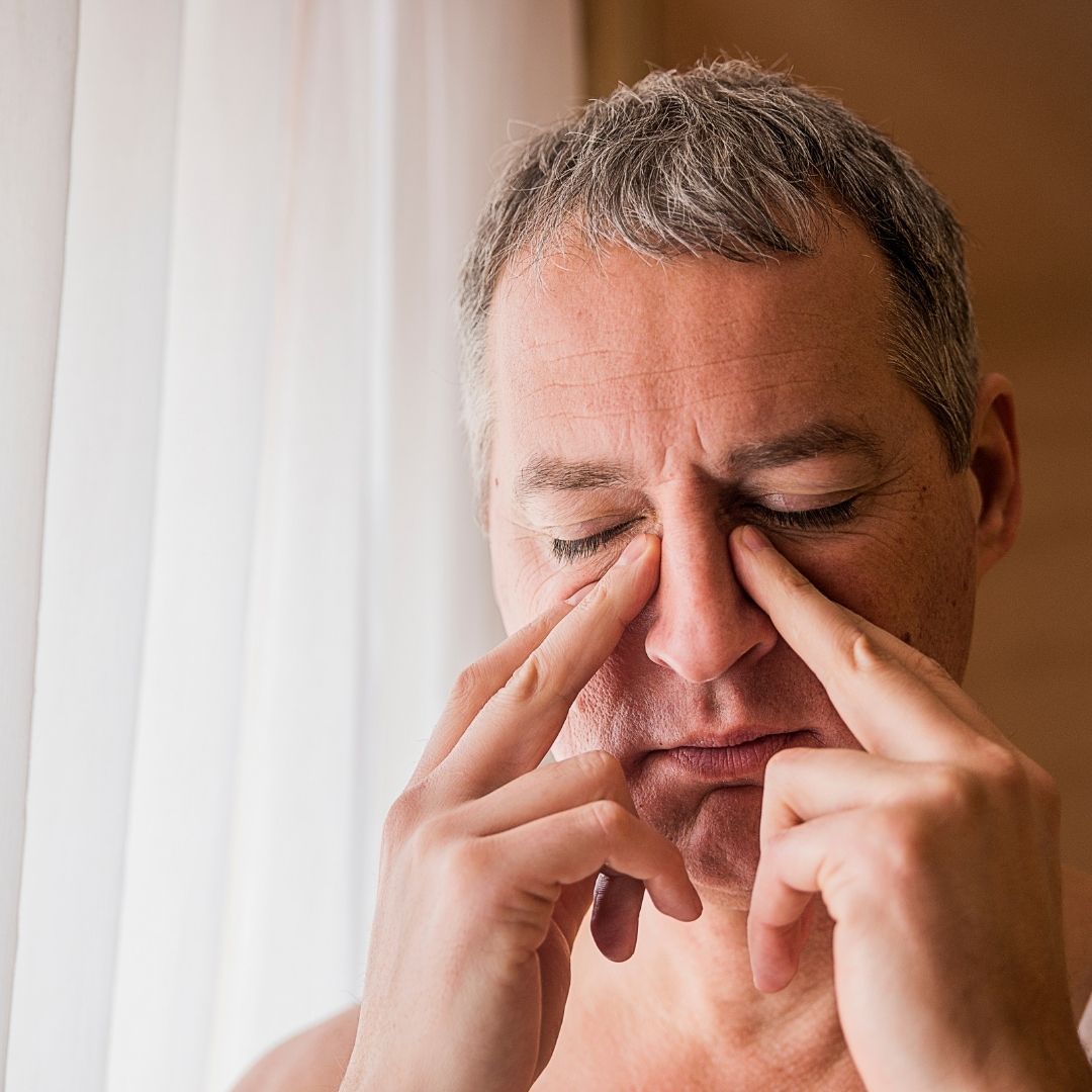 Man with sinus pain