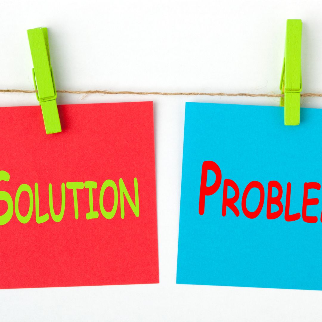 sticky notes saying problem and the other sticky note saying solution