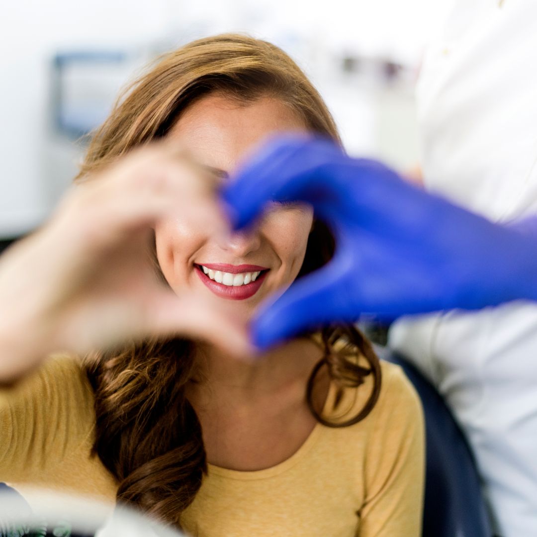 two hands creating a heart