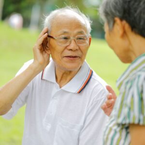 elderly man with hearing problems