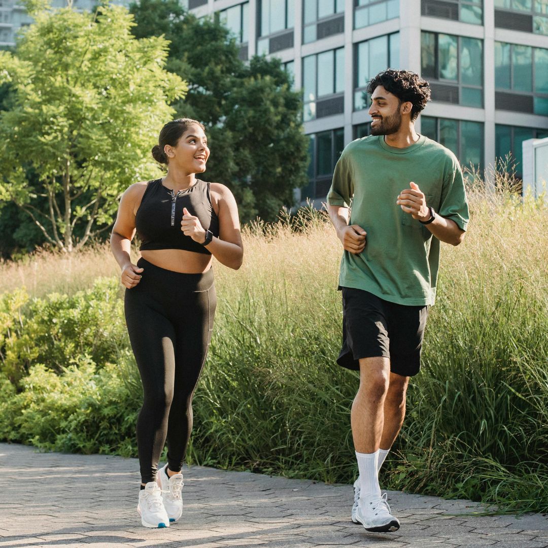 a man and woman running