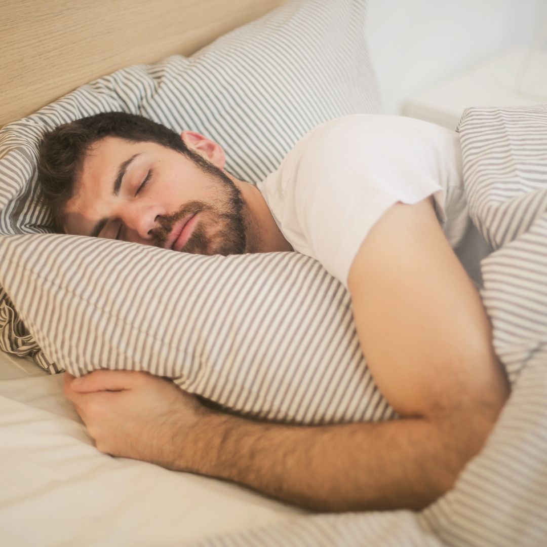 a man sleeping on his side