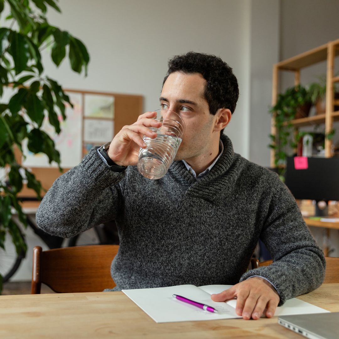 a man drinking water