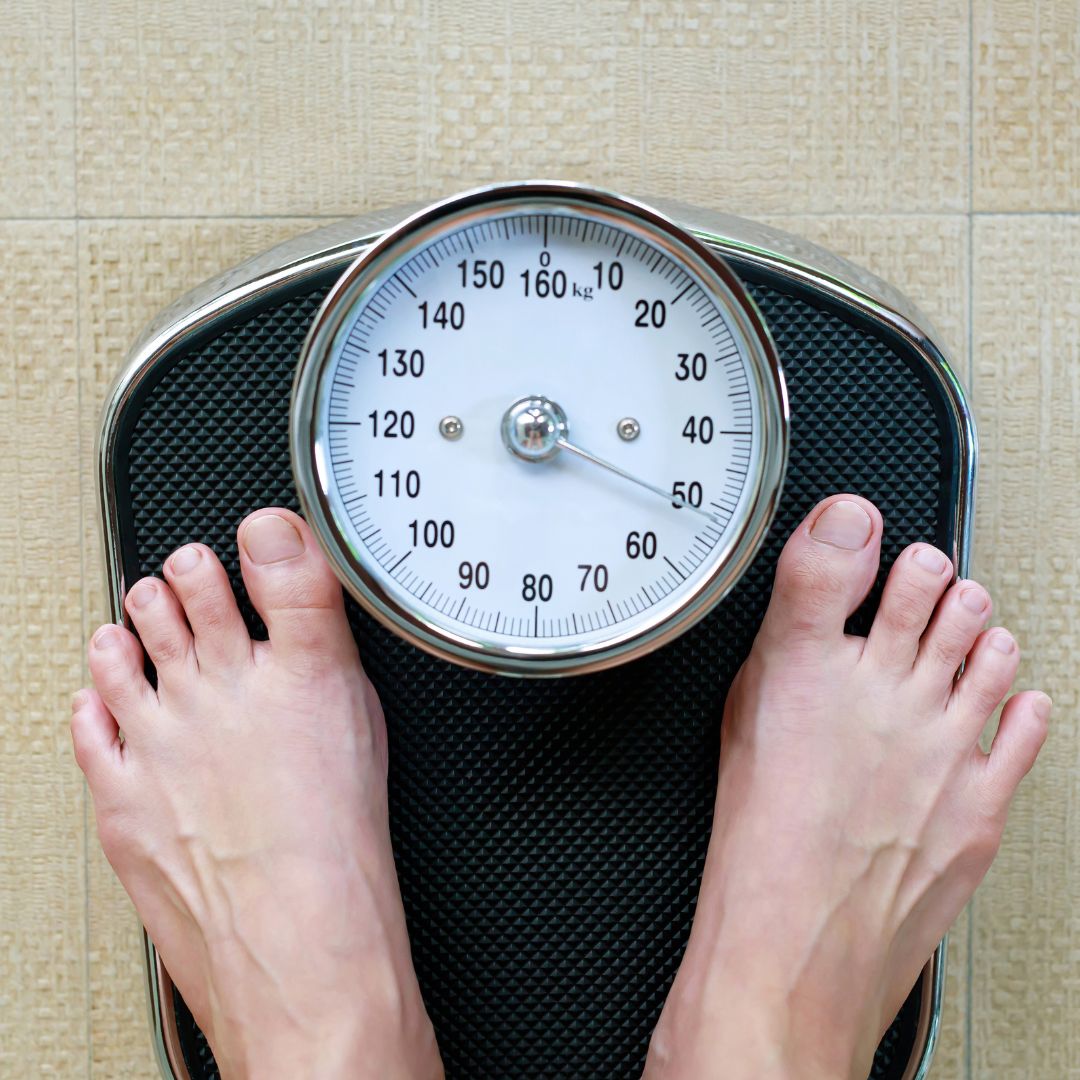 a person standing on a scale