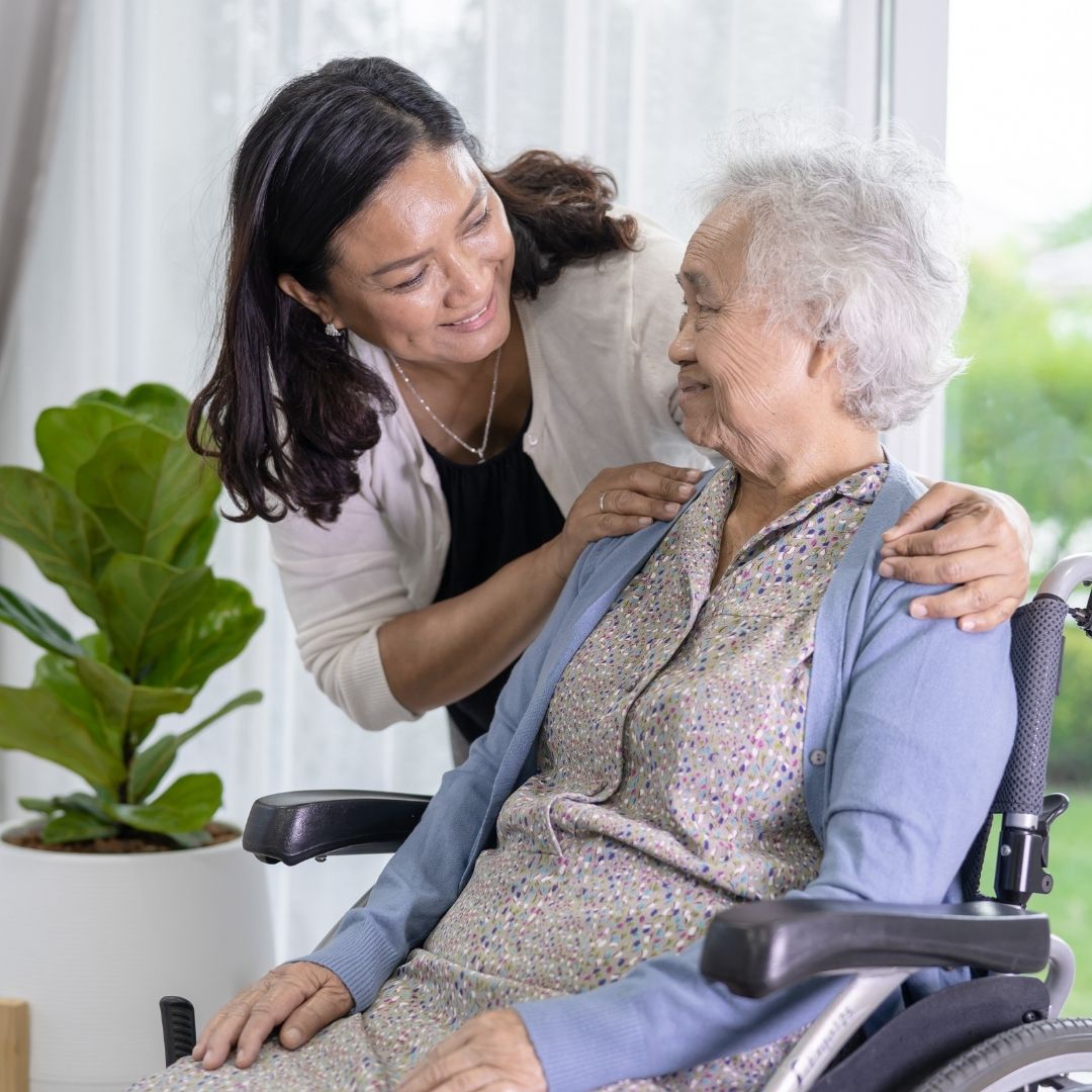 older woman with dementia receiving care