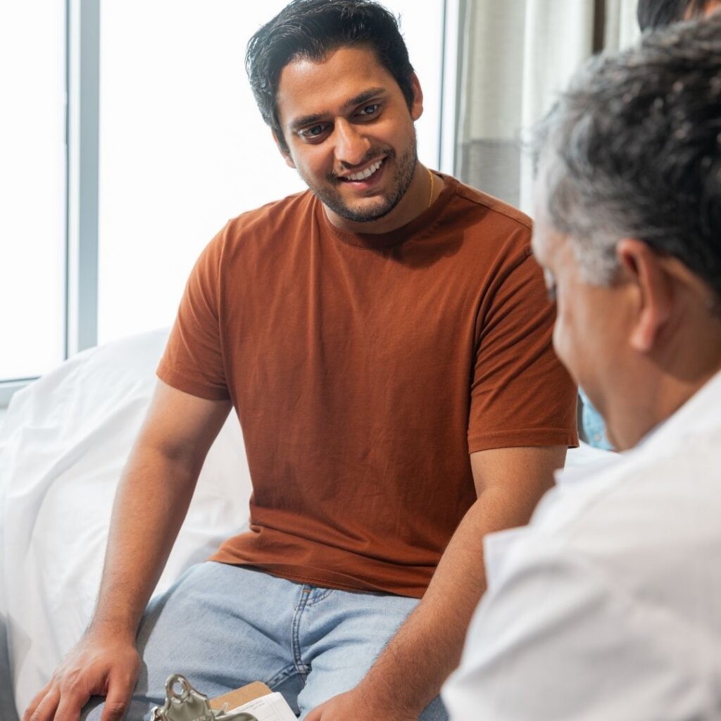 man talking to an ENT doctor